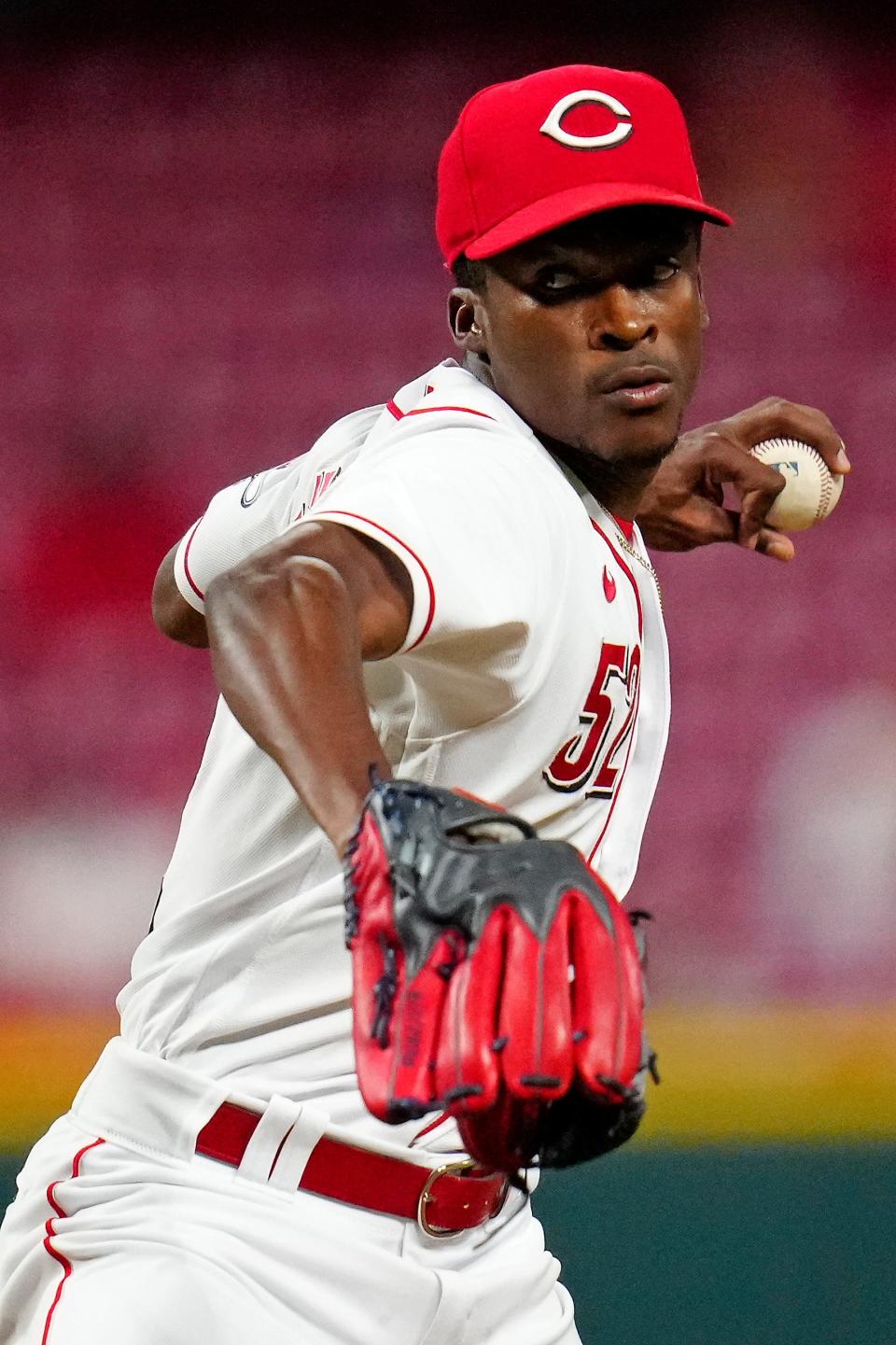 Cincinnati Reds relief pitcher Reiver Sanmartin (52) throws a pitch in the eighth inning of the MLB National League game between the Cincinnati Reds and the Philadelphia Phillies at Great American Ball Park in downtown Cincinnati on Tuesday, Aug. 16, 2022. The Reds lost 11-4. 