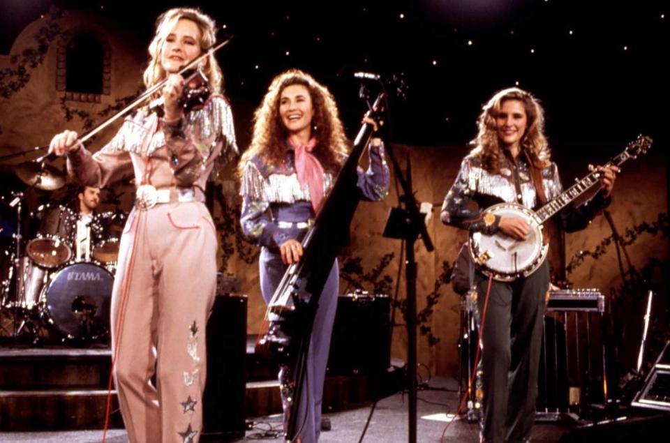 <p>Courtesy Everett Collection</p> Laura Lynch (center) performs with The Chicks in 1993.