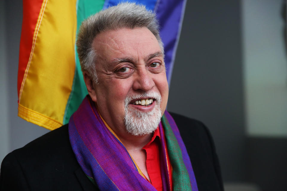 NEW YORK, NY - JANUARY 07:  Rainbow Flag Creator Gilbert Baker poses at the Museum of Modern Art (MoMA) on January 7, 2016 in New York City. MoMa announced in June 2015 its acquisition of the iconic Rainbow Flag into the design collection. Baker, an openly gay artist and civil rights activist, designed the Rainbow Flag in 1978. The flag has since become a prominent symbol to the gay community around the world. (Photo by Spencer Platt/Getty Images)