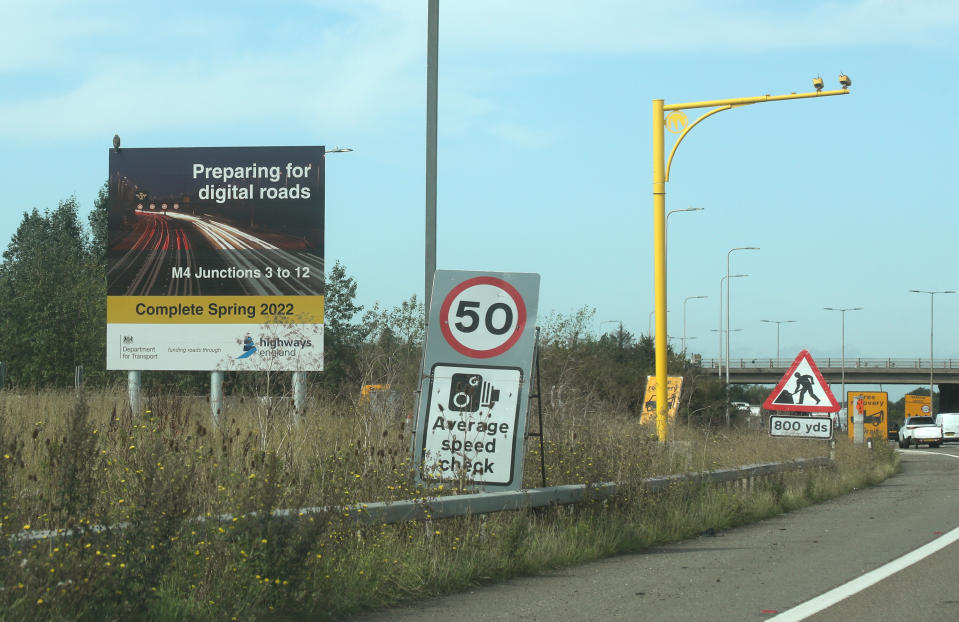 A sign announcing the forthcoming 'smart motorway' on the M4 road in Slough, Berkshire. One of the ways Highways England is increasing capacity is by creating smart motorways.