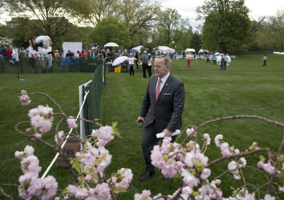 Copyright 2017 The Associated Press. All rights reserved. This material may not be published, broadcast, rewritten or redistributed without permission. Mandatory Credit: Photo by AP/REX/Shutterstock (8612887r) White House press secretary Sean Spicer walks across the South Lawn of the White House in Washington, during the annual White House Easter Egg Roll Trump Easter Egg Roll, Washington, USA - 13 Apr 2017
