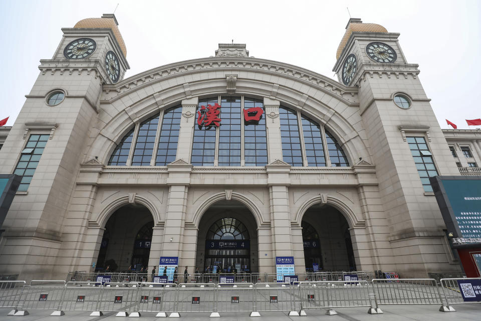 Barricades block access to the closed Hankou Railway Station in Wuhan in central China's Hubei Province, Thursday, Jan. 23, 2020. China closed off a city of more than 11 million people Thursday in an unprecedented effort to try to contain a deadly new viral illness that has sickened hundreds and spread to other cities and countries amid the Lunar New Year travel rush. (Chinatopix via AP)