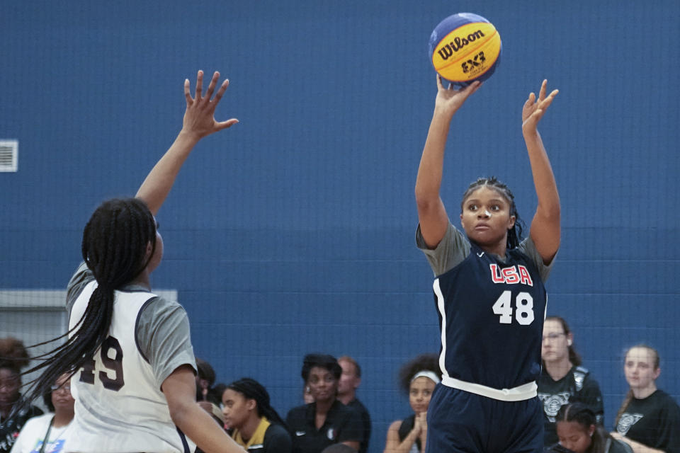 United States' ZaKiyah Johnson (48) shoots during the team's practice at the NCAA College Basketball Academy, Friday, July 28, 2023 in Memphis, Tenn. Several of the top coaches in the women's game filled the sidelines, watching, evaluating and scrutinizing prospects, and whenever Johnson, Darianna Alexander and Divine Bourrage took the court the lineup filling the sideline included LSU's Kim Mulkey, South Carolina's Dawn Staley and UCLA's Cori Close. (AP Photo/George Walker IV)