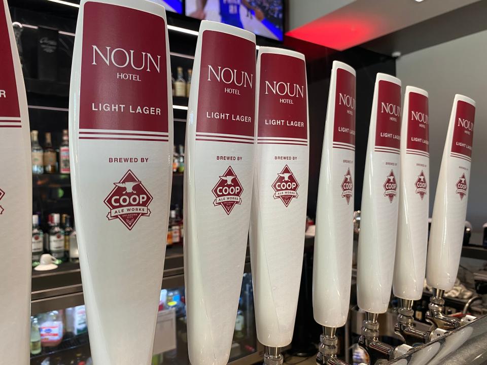 NOUN Hotel Light Lager is seen on tap at ONE Bar at the NOUN Hotel in Norman during the April 17 NOUN Hotel Light Lager X COOP Ale Works launch party.