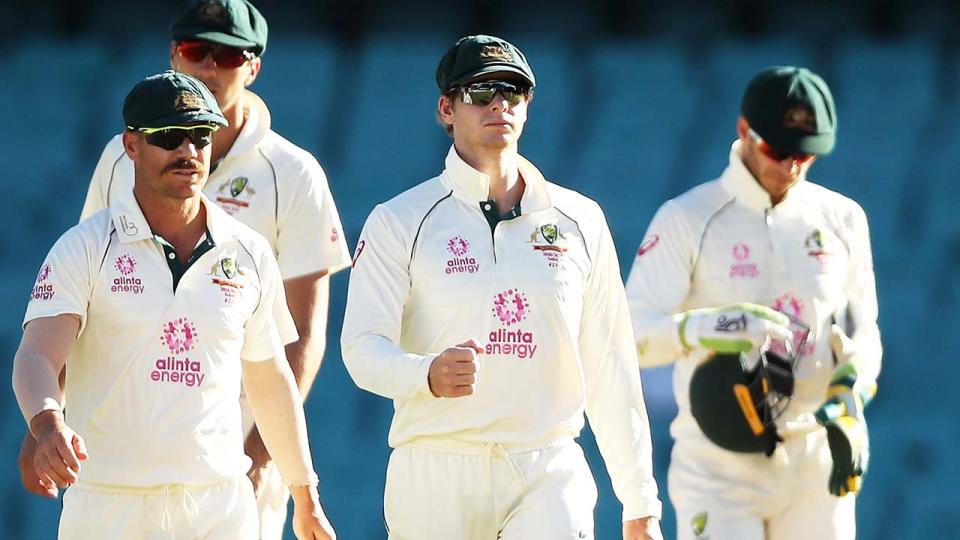 David Warner, Steve Smith and Tim Paine, pictured here leaving the field after their draw with India.