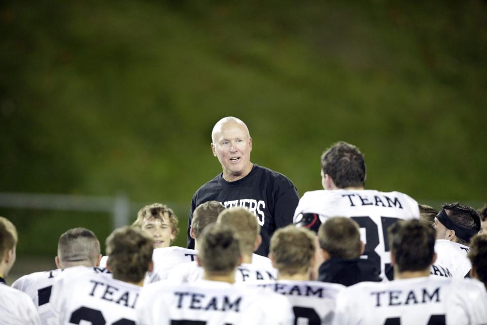 Keith Wakefield talks to his team following a game vs. McKinley.