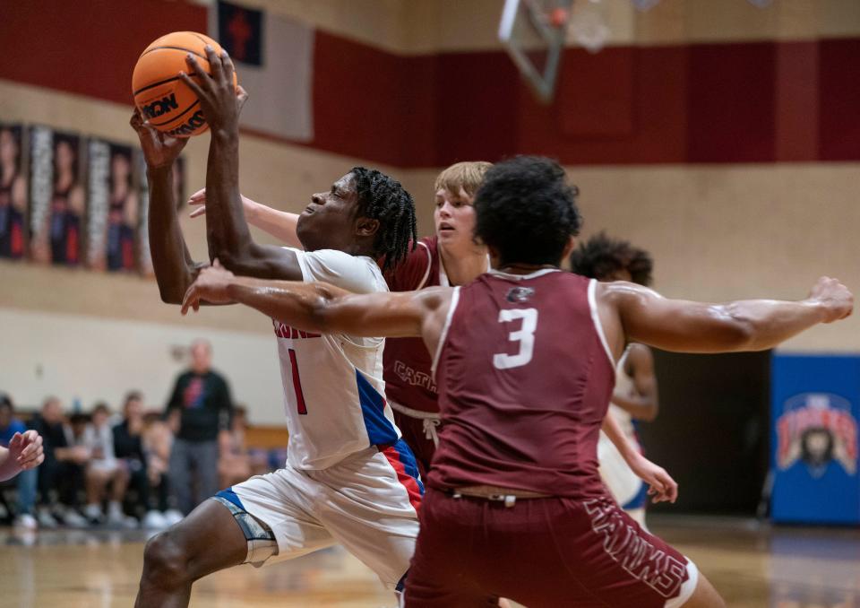 King's Academy Javian Jones drives the lane against Santa Fe Catholic in West Palm Beach, Florida on February 16, 2023.