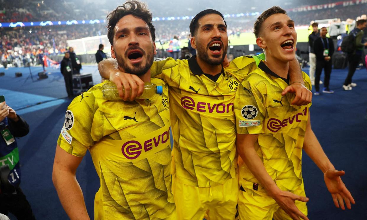 <span>(From left) Mats Hummels, Emre Can and Nico Schlotterbeck of Borussia Dortmund celebrate booking a place in the Champions League final.</span><span>Photograph: Kai Pfaffenbach/Reuters</span>