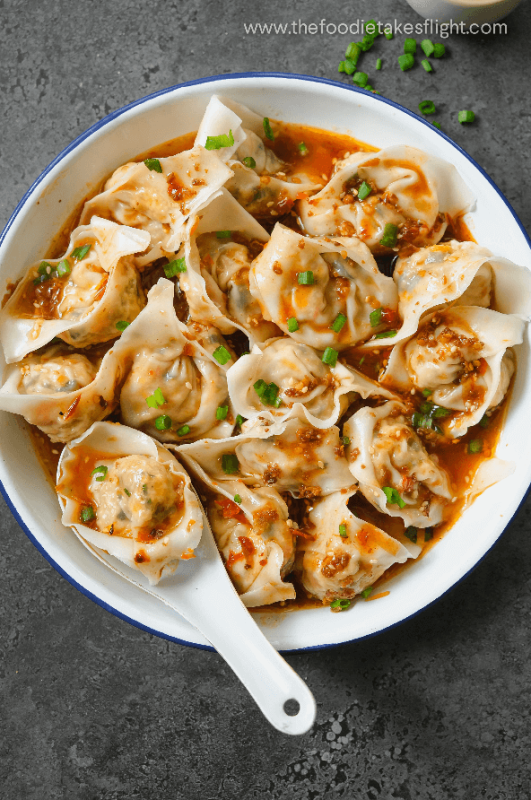 <p>The Foodie Takes Flight</p><p>Wontons in a spicy chili crisp broth is probably the most underrated dishes of all time.</p><p><strong>Get the recipe here: <a href="https://thefoodietakesflight.com/omnipork-wontons-in-chili-broth/" rel="nofollow noopener" target="_blank" data-ylk="slk:Vegan Wontons in Chili Broth;elm:context_link;itc:0;sec:content-canvas" class="link rapid-noclick-resp">Vegan Wontons in Chili Broth</a></strong></p>