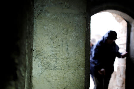 An image of what a researcher says is a galley, or rowing boat, is seen on a wall in the Cenacle, a hall revered by Christians as the site of Jesus' Last Supper, in Mount Zion near Jerusalem's Old City March 14, 2019. REUTERS/Amir Cohen