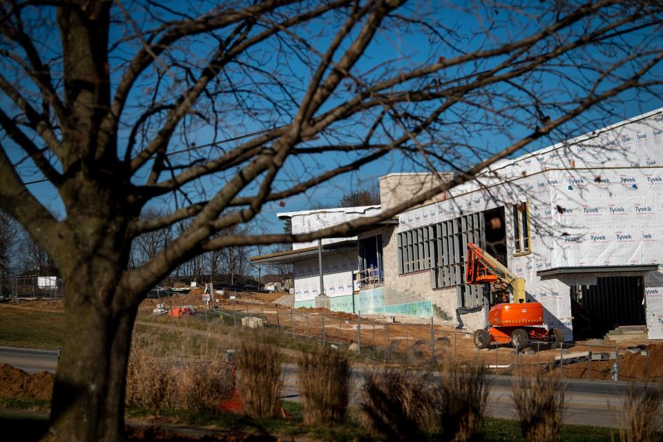  A tree that is to be removed in the 700 block sits across the street from a new branch of the Monroe County Public Libaray being constructed on Gordon Pike on Wednesday, Nov. 23, 2022.