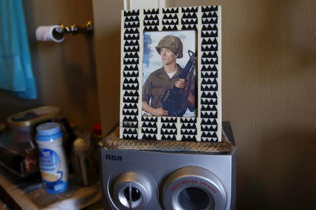 A photograph is seen in a home at Quixote Village in Olympia, Washington October 11, 2015. REUTERS/Shannon Stapleton