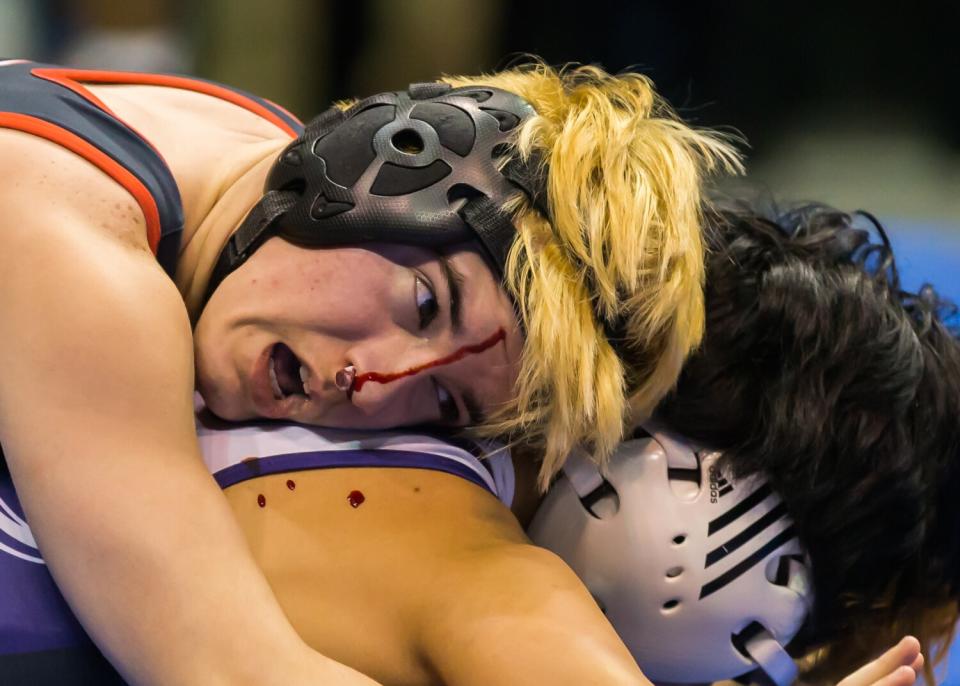 Mack Beggs competes despite dealing with a nose bleed during a girls Texas high school state tournament in February 2017.