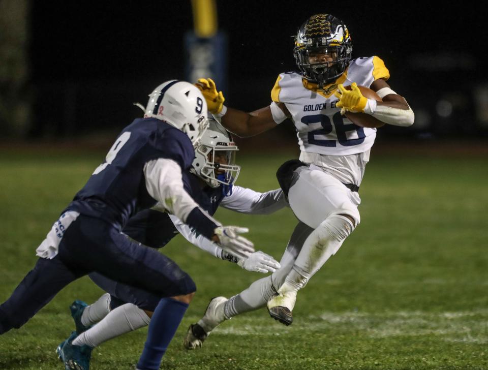 Christian Davis of Desert Hot Springs runs for first down against Jurupa Valley in Desert Hot Springs, Calif., Nov. 3, 2023.