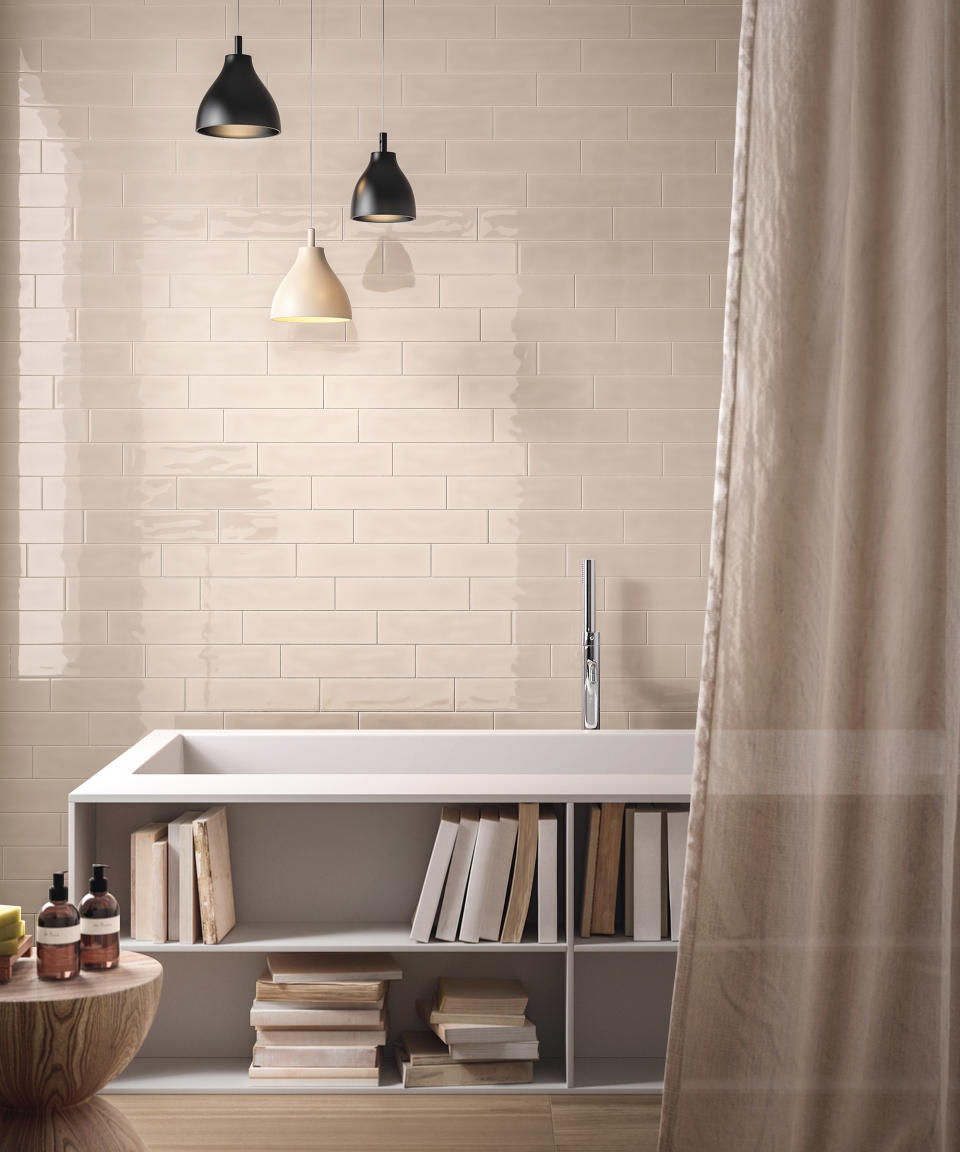 A bath with in-built bookshelves
