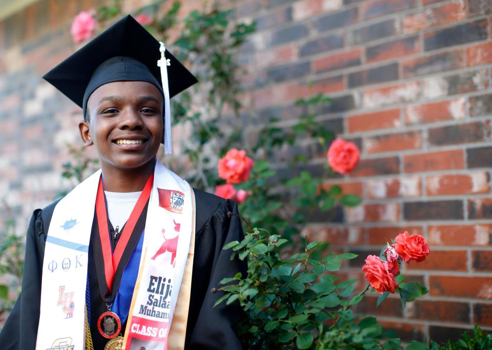 Elijah Muhammad, 13, poses for photo Wednesday at his home in Oklahoma City.