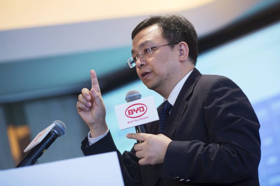 Wang Chuanfu, chairman of BYD Co., speaks during a news conference in Hong Kong, China, on Thursday, March 21, 2013. BYD, the Chinese automaker partially owned by Warren Buffett’s Berkshire Hathaway Inc., is targeting to have 1,000 electric taxis in operation in Hong Kong before 2014 and more than 3,000 in 2015, according to the company. Photographer: Jerome Favre/Bloomberg via Getty Images
