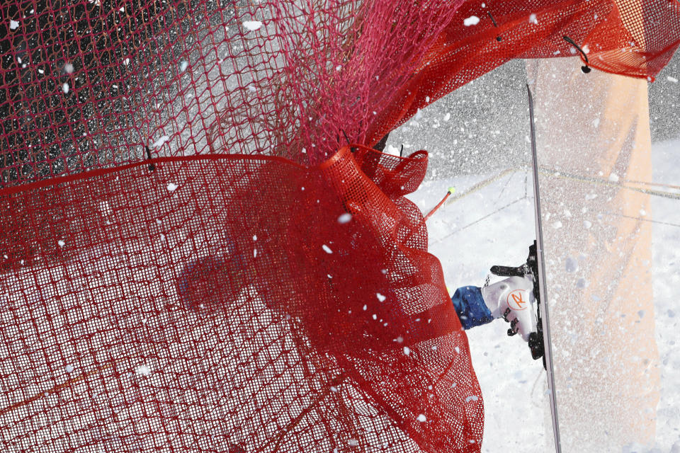 United States' Ryan Cochran Siegle crashes onto the safety net during an alpine ski, men's World Cup downhill in Kitzbühel, Austria, Jan. 22, 2021. (AP Photo/Marco Trovati)