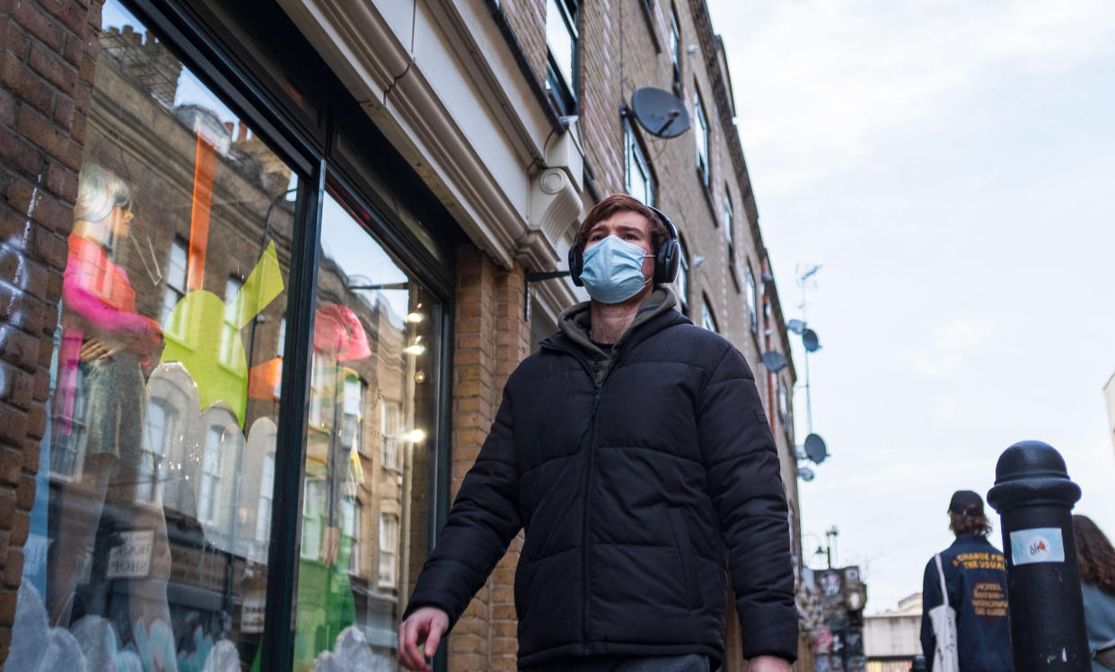  A man wearing a face mask walking on the street in London
Prime Minister Boris Johnson unveils plan to end England restrictions. A new four-step plan to ease England's lockdown could see all legal limits on social contact lifted by 21 June, if strict conditions are met. (Photo by May James / SOPA Images/Sipa USA) 