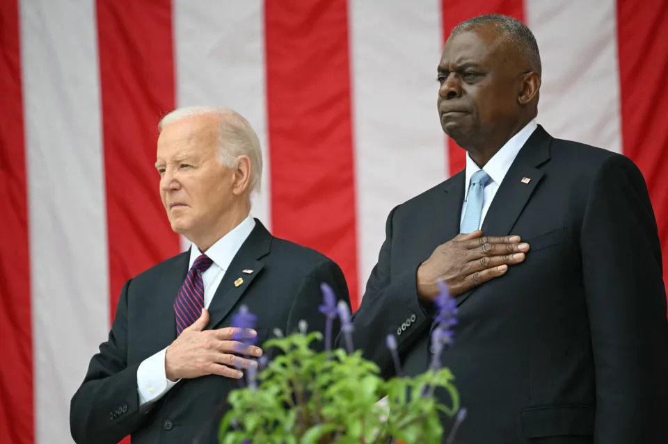 President Joe Biden and Defense Secretary Lloyd Austin attend the Memorial Day observance at Arlington National Cemetery outside Washington, D.C., on May 27, 2024.