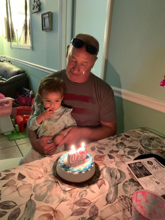 Mike Foy with his granddaughter Syndey in 2019. Foy, who is from the Jersey Shore, is in jail in the British Virgin Islands on illegal fishing charges while his family is fighting for his release.