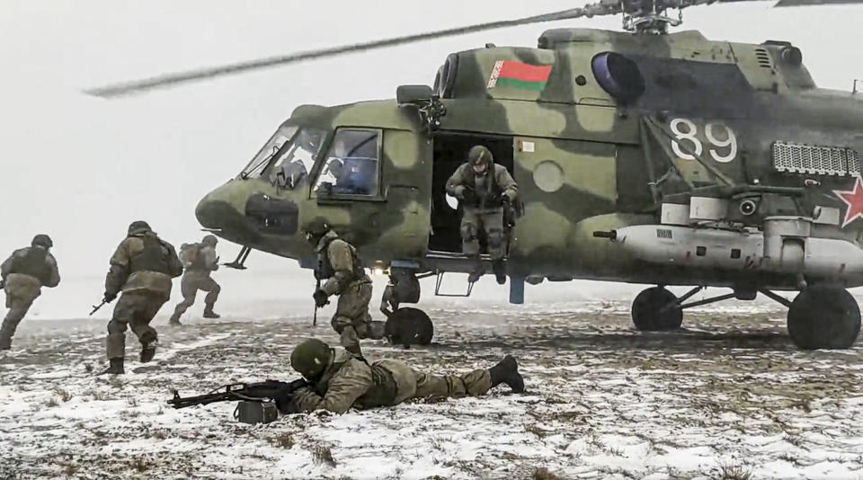 In this photo taken from video and released by the Russian Defense Ministry Press Service on Friday, Feb. 4, 2022, soldiers take part in the Belarusian and Russian joint military drills at Brestsky firing range, Belarus. Russian and Belarus troops held joint combat training at firing ranges in Belarus. The drills involved motorized rifle, artillery and anti-tank missile units, as well tanks and armored personnel carriers crews. (Russian Defense Ministry Press Service via AP)