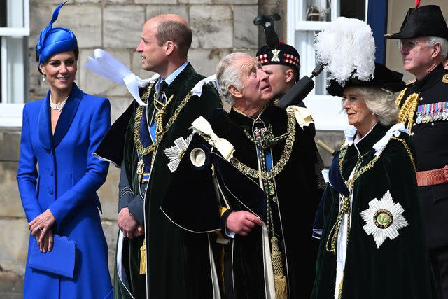 <p>JOHN LINTON/POOL/AFP via Getty Images</p> Kate Middleton, Prince William, King Charles and Queen Camilla watch the flypast after the National Service of Thanksgiving.