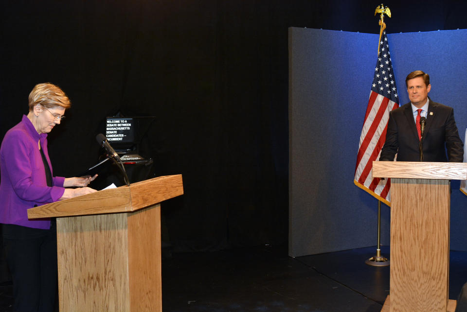 Democratic U.S. Sen. Elizabeth Warren, left, and Republican challenger state Rep. Geoff Diehl participate in a U.S. Senate debate, Sunday, Oct. 21, 2018, in Springfield, Mass. (Frederick Gore/The Republican via AP)