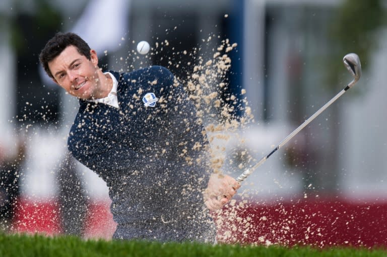 Rory McIlroy of Northern Ireland hits from a bunker during a practice round ahead of 41st Ryder Cup at Hazeltine National Golf Course in Chaska, Minnesota, September 27, 2016