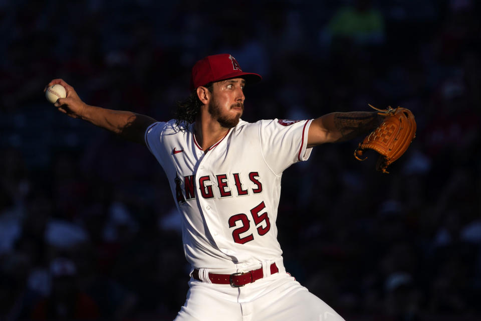 Los Angeles Angels starting pitcher Michael Lorenzen throws to the plate during the second inning of a baseball game against the Seattle Mariners Friday, June 24, 2022, in Anaheim, Calif. (AP Photo/Mark J. Terrill)