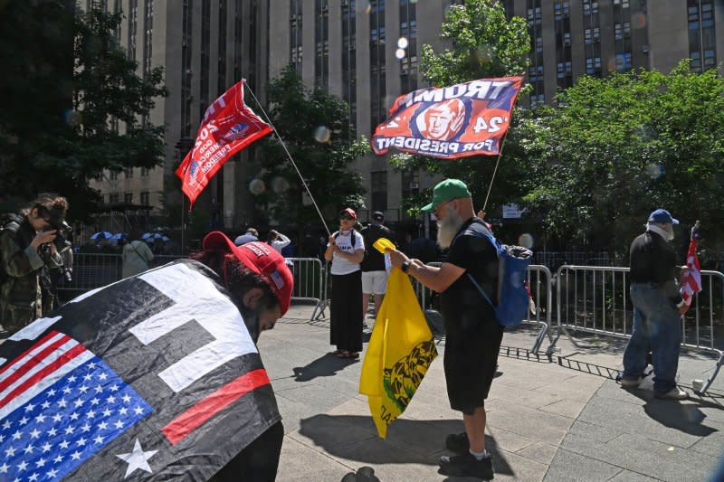 Supporters of former President Donald Trump demonstrate outside the courthouse where Trump is on trial in New York, on Thursday, May 30, 2024. Jurors have begun their deliberations in the felony trial of the former president, who is charged with making hush-money payments to silence an adult film actress in 2016. Photo by Louis Lanzano/UPI