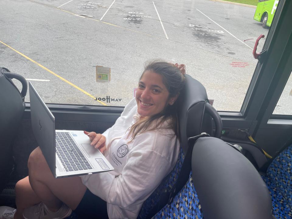 The author working on her laptop while sitting on her seat on a FlixBus service.