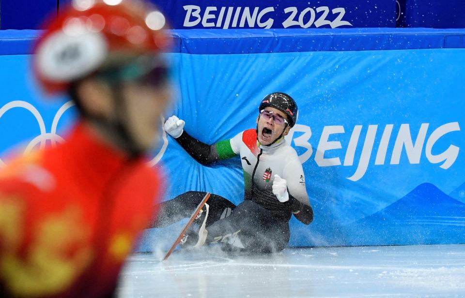 Shaolin Sandor Liu of Hungary reacts after competing in the men's 1000-meter short track speed skating final.