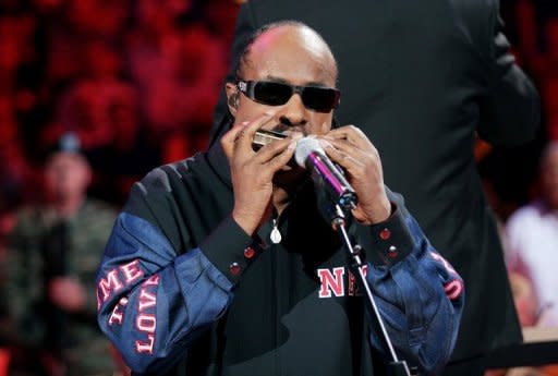 Singer Stevie Wonder performs the National Anthem on a harmonica at the 2005 NBA Finals. "When I heard Stevie Wonder, I said, 'Jesus, that instrument can do. I love that sound'," Adam Glasser said