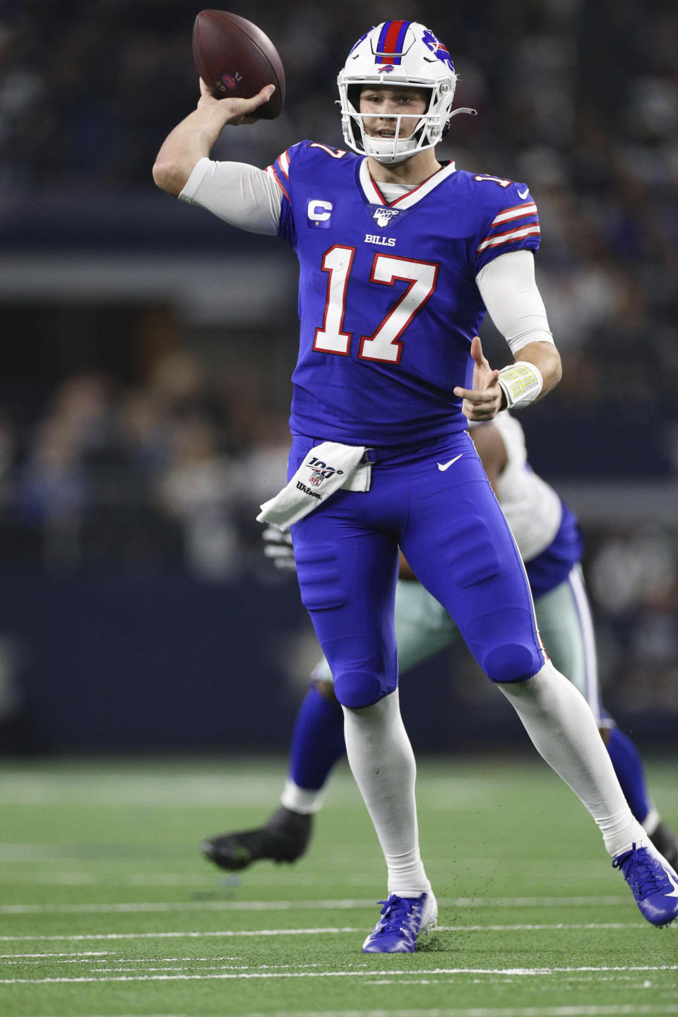 Buffalo Bills quarterback Josh Allen (17) passes downfield to a receiver in an NFL game against the Dallas Cowboys, Thursday, Nov. 28, 2019 in Dallas. The Bills defeated the Cowboys 26-15. (Margaret Bowles via AP)