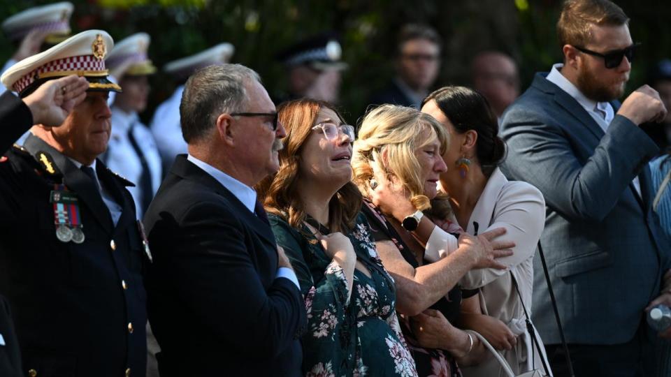 Steven Tougher’s dad Jeff comforts his daughter-in-law Madison Tougher (From left: Jeff Tougher, Madison Tougher, Jill Tougher and Jess Tougher) Picture: NCA NewsWire / Dean Lewins