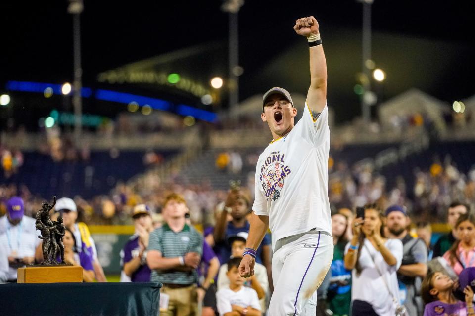 Jun 26, 2023; Omaha, NE, USA; LSU Tigers second baseman Gavin Dugas (8) celebrates after winning the College World Series over the Florida Gators at Charles Schwab Field Omaha. Mandatory Credit: Dylan Widger-USA TODAY Sports