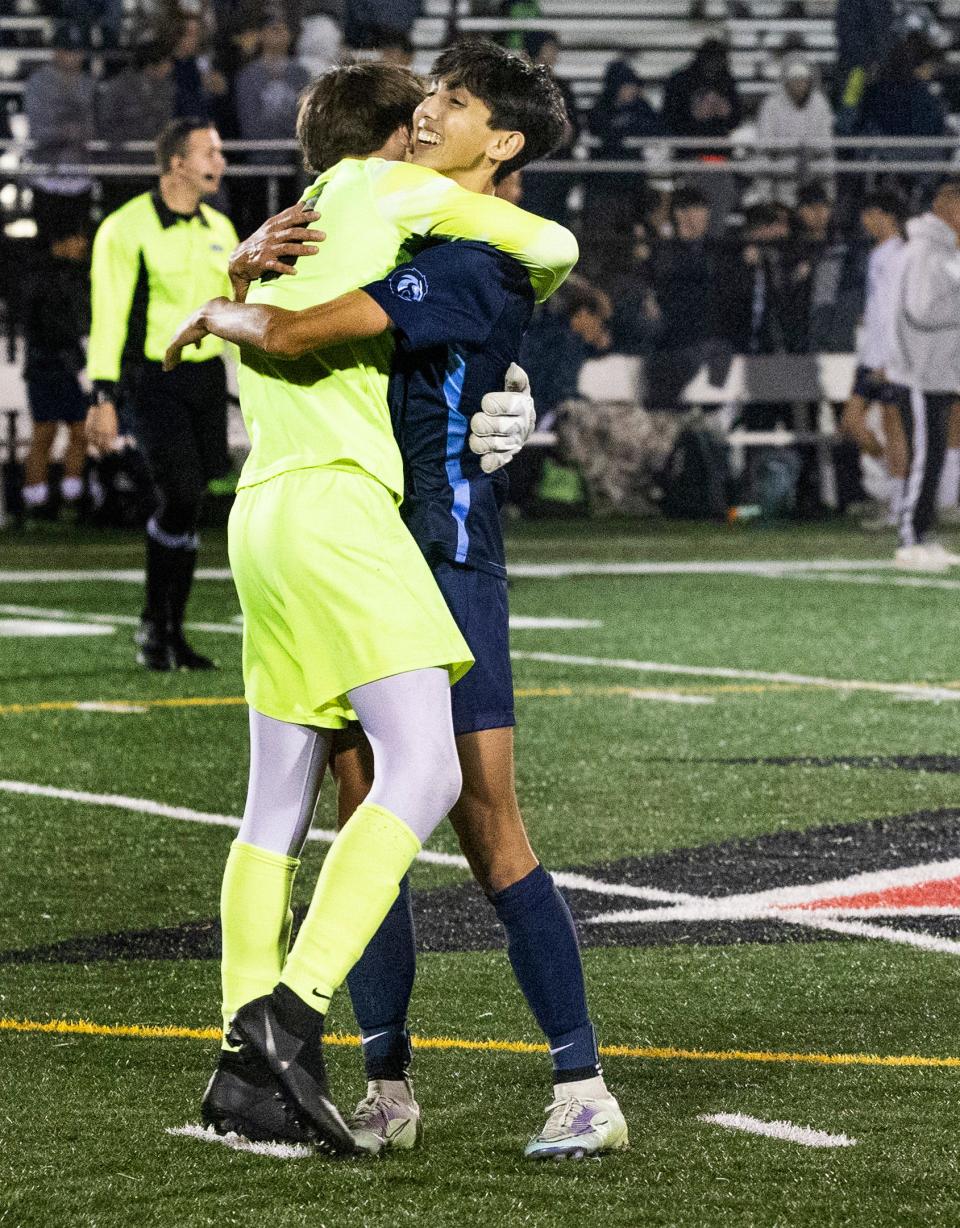 CBA goalie Miles Gallagher and Cameron D’Alterio celebrate after winning the game. Christian Brothers Academy defeats Howell 2-1 in Shore Conference Tournament Final in Neptune NJ. October 22, 2022. 