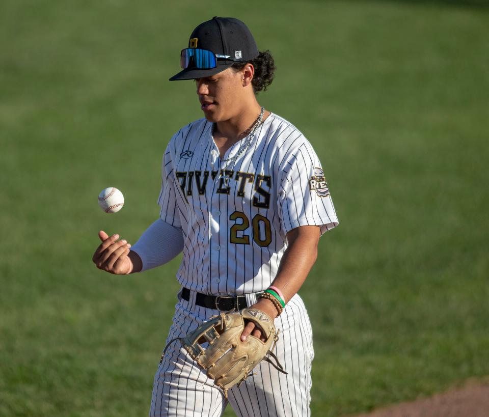 Rivets Bryce Vincent walks onto the field on Monday, Aug. 1, 2022, at Rivets Stadium  in Loves Park. Monday's game was the team's first at home after the team bus was broken into over the weekend in Michigan resulting in a lot of their baseball equipment being stolen.