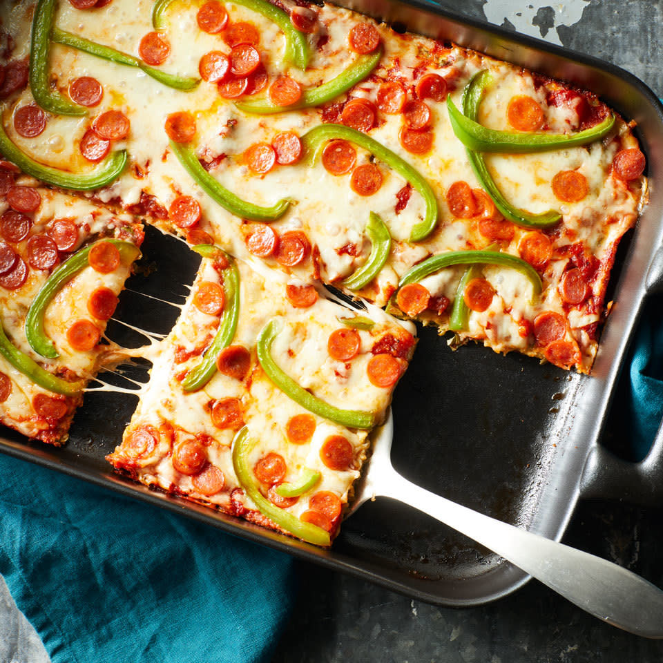 <p>Got a bumper crop of zucchini? Try this crowd-pleasing casserole-meets-pizza dish, which can easily be made gluten-free. A layer of tender shredded zucchini is topped with all the classics: sauce, cheese, pepperoni and sliced bell pepper. Experiment with your own favorite toppings, but make sure you don't overload the crust or it will be too wet.</p> <p> <a href="https://www.eatingwell.com/recipe/266355/zucchini-pizza-casserole/" rel="nofollow noopener" target="_blank" data-ylk="slk:View Recipe" class="link ">View Recipe</a></p>