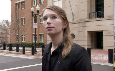 FILE PHOTO: Former U.S. Army intelligence analyst Chelsea Manning speaks to reporters outside the U.S. federal courthouse shortly before appearing before a federal judge and being taken into custody as he held her in contempt of court for refusing to testify before a federal grand jury in Alexandria, Virginia, U.S. March 8, 2019. REUTERS/Ford Fischer/News2Share/File Photo