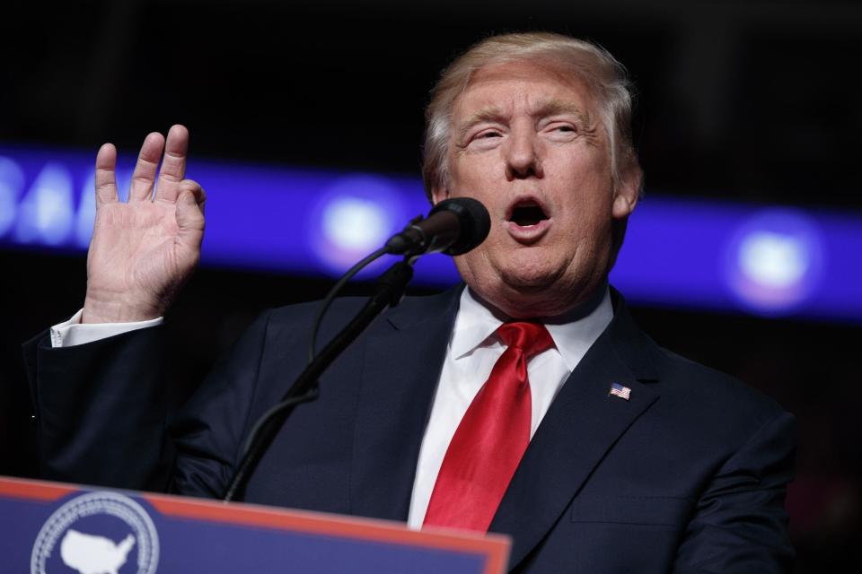 FILE - In this Thursday, Dec. 15, 2016, file photo, President-elect Donald Trump speaks during a rally at the Giant Center in Hershey, Pa. Trump's closest advisers see Democrats' complaints that Moscow hacked their private emails this election season as a case of sour grapes. The pushback comes ahead of the Electoral College vote, Monday, Dec. 19, which is expected to make official Trump's election win. (AP Photo/Evan Vucci, File)