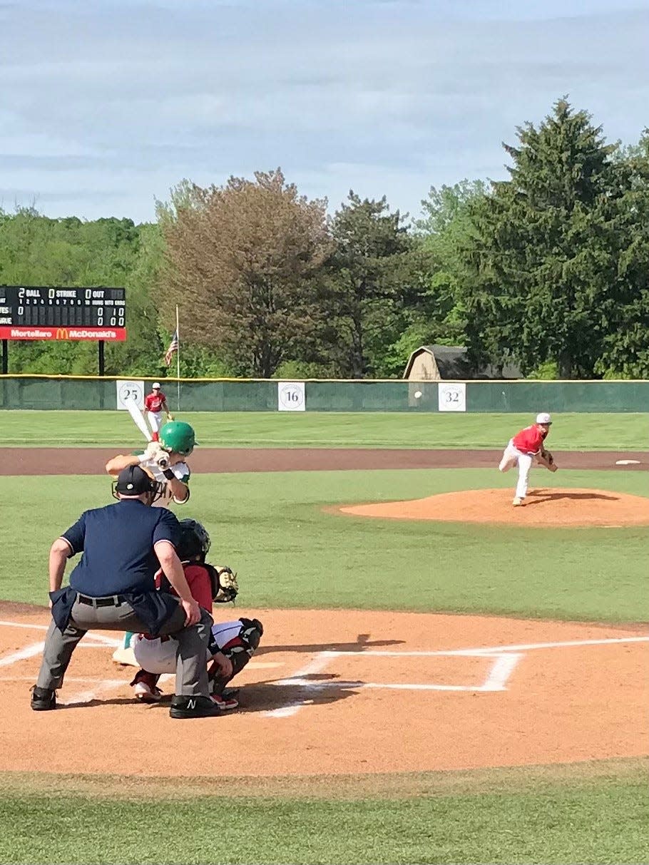 Cardington's Wyatt Wade delivers a pitch to a Newark Catholic batter during Wednesday's Division IV baseball district championship game at Mount Vernon Nazarene University.