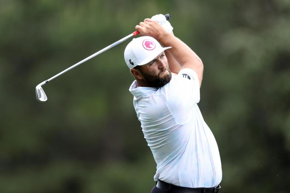 PHOTO: Jon Rahm of Spain plays a shot on the fifth hole during the first round of the 2024 Masters Tournament at Augusta National Golf Club on April 11, 2024 in Augusta, Ga. (Warren Little/Getty Images)