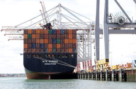 FILE PHOTO: Shipping containers are stacked on a cargo ship in the dock at the ABP port in Southampton, Britain August 16, 2017. Picture taken August 16, 2017. REUTERS/Peter Nicholls/File Photo