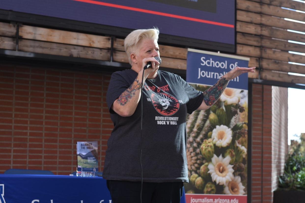 Jenn Budd, a former U.S. Border Patrol agent who advocates for immigrant rights, spoke at the University of Arizona in Tucson on Oct. 10, 2022.