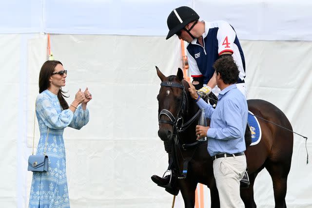 <p>Karwai Tang/WireImage</p> Kate Middleton and Prince William attend the charity polo match on July 6