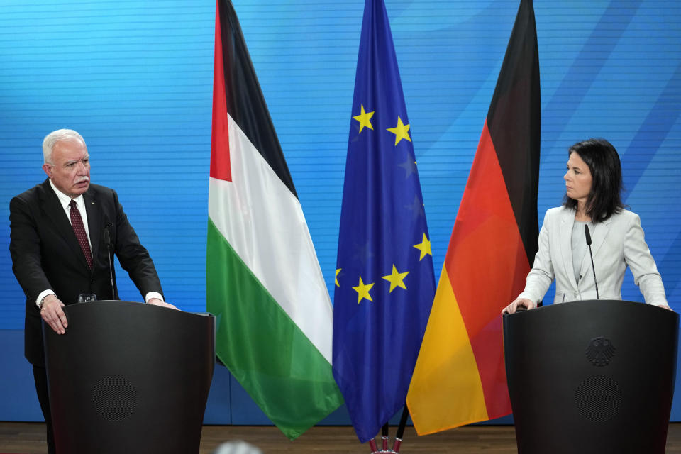 Palestinian Foreign Minister Riyad al-Maliki, left, and German Foreign Minister Annalena Baerbock attend a joint press conference at the Foreign Ministry in Berlin, Tuesday, Feb. 13, 2024. (AP Photo/Ebrahim Noroozi)