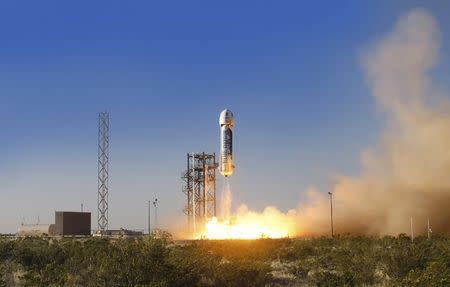 The New Shepard space vehicle blasts off on its first developmental test flight over Blue Origin's west Texas launch site in this handout provided by Blue Origin April 30, 2015. REUTERS/Blue Origin/Handout via Reuters