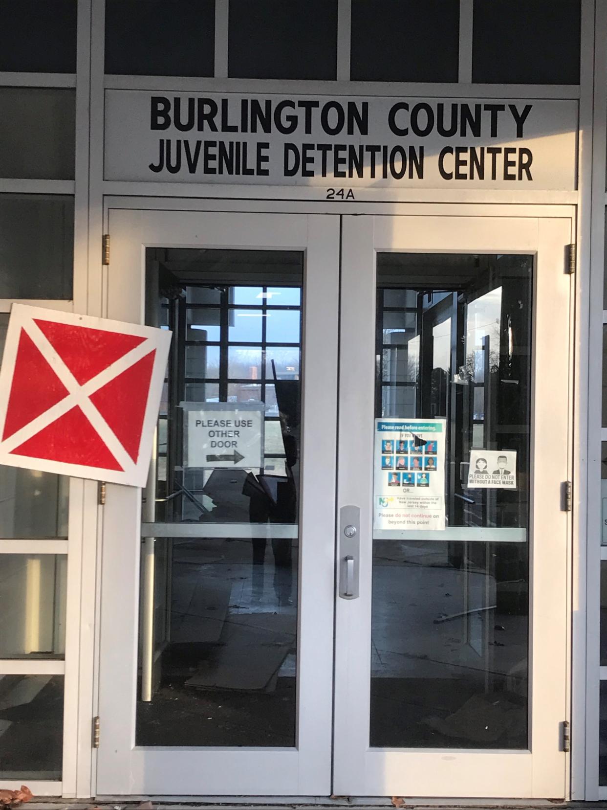 A red X danger marker warns against  trespassers at the closed Burlington County Juvenile Detention Center in Pemberton Township. The county wants to demolishs it.